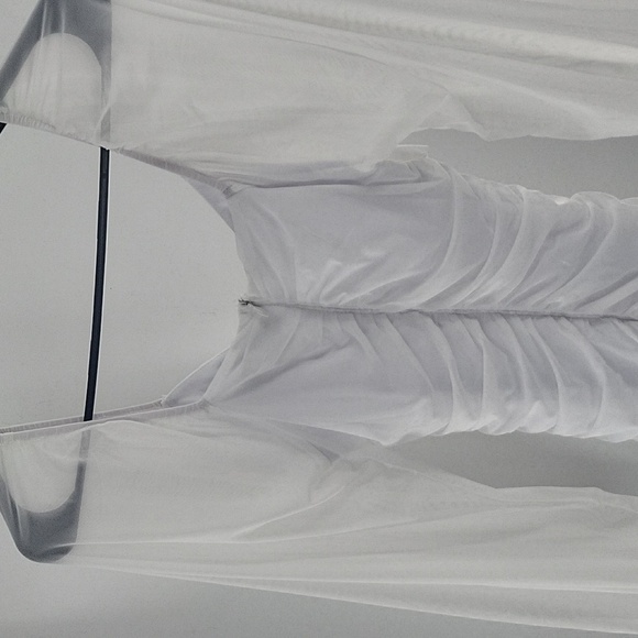 Elegant White Dress With Semi Transparent Sleeves - Picture 16 of 16